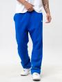 Spodnie Dresowe Męskie Loose Fit Niebieskie SSG Small Logo