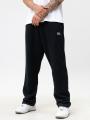 Spodnie Dresowe Męskie Loose Fit Czarne SSG Small Logo